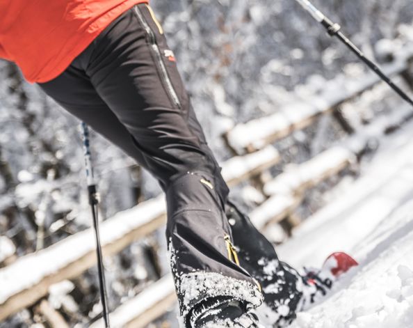 A woman is snowshoeing