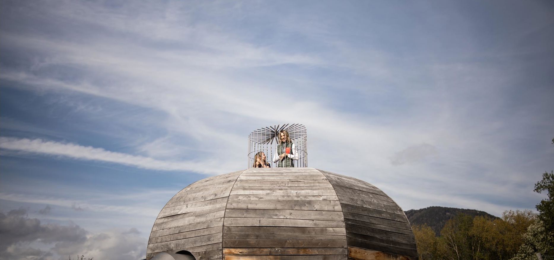 A woman is playing with a child at the Apfelgarten playground